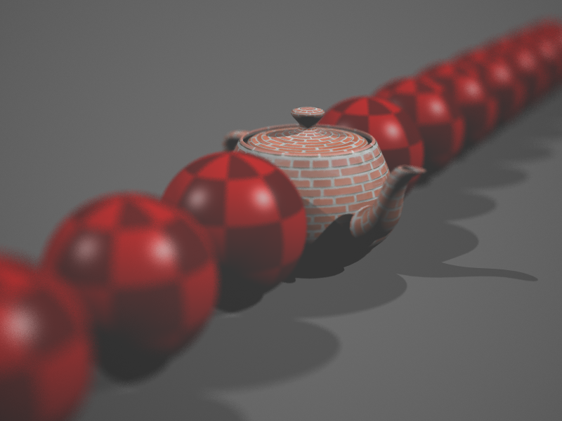 Rendering of teapot and many spheres, with depth of field.